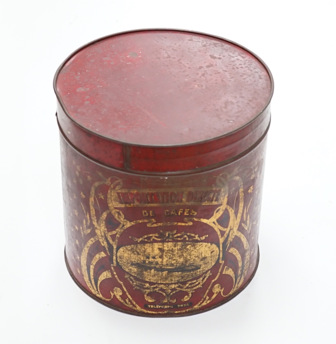 A cylindrical French Toleware coffee tin, 31cm high